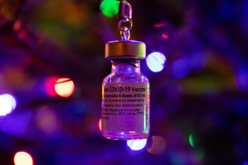 covid19 vaccine bottle - paid leave for covid vaccine 2022 (payroll belgium)